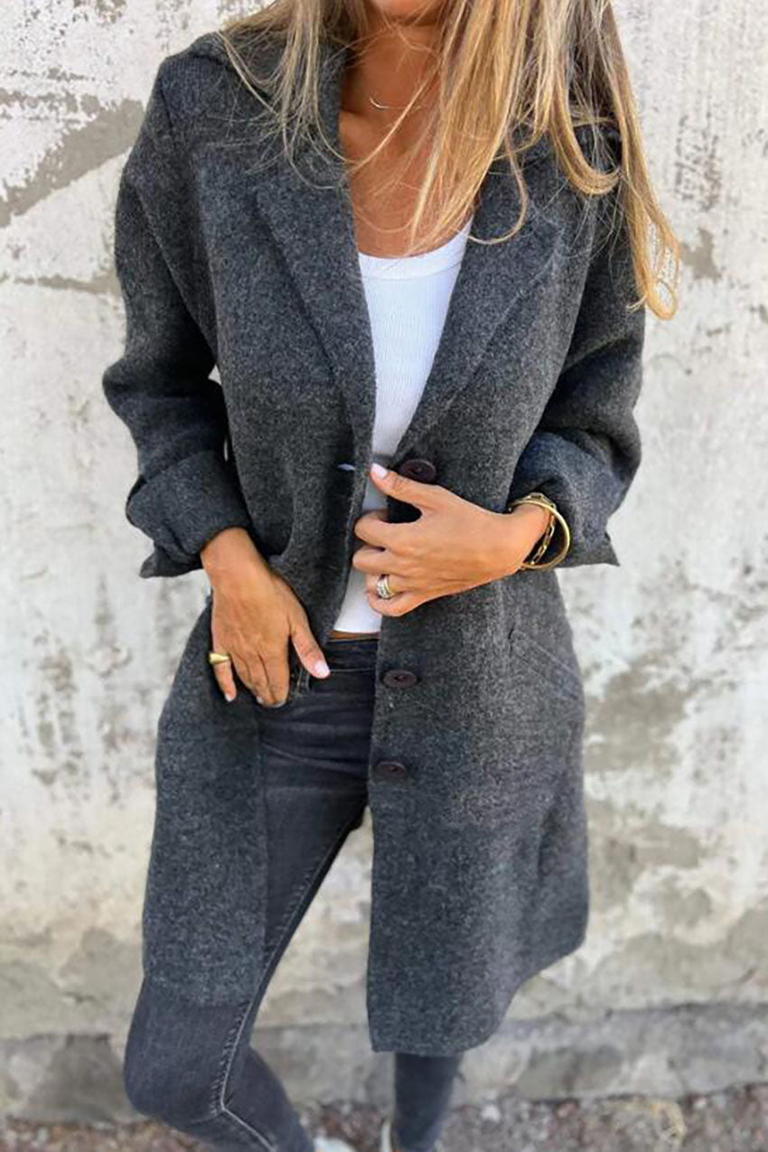 Manteau mi-long à simple boutonnage avec poche à revers de couleur unie