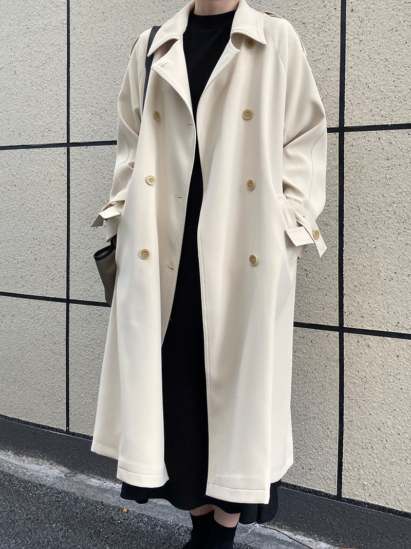 Drapey British style loose mid-length trench coat