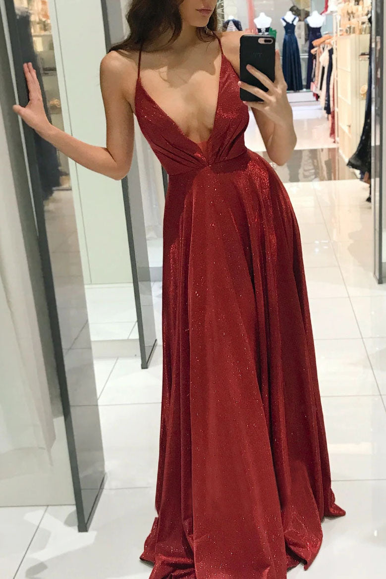 Vestido sin espalda con tirantes finos y bolsillos con cuello en V profundo