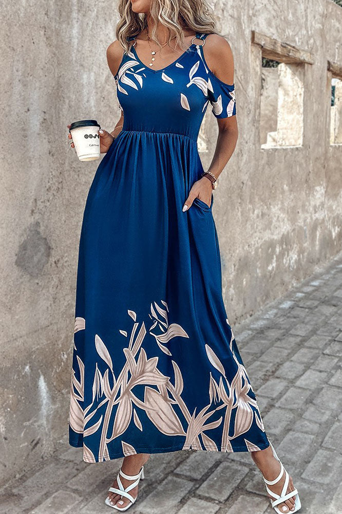 Vestido largo con hombros descubiertos y cintura ceñida con estampado floral azul