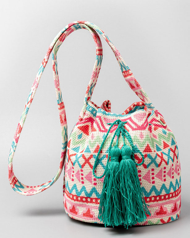 Bolso bombonera de lona con flecos y estampado bohemio