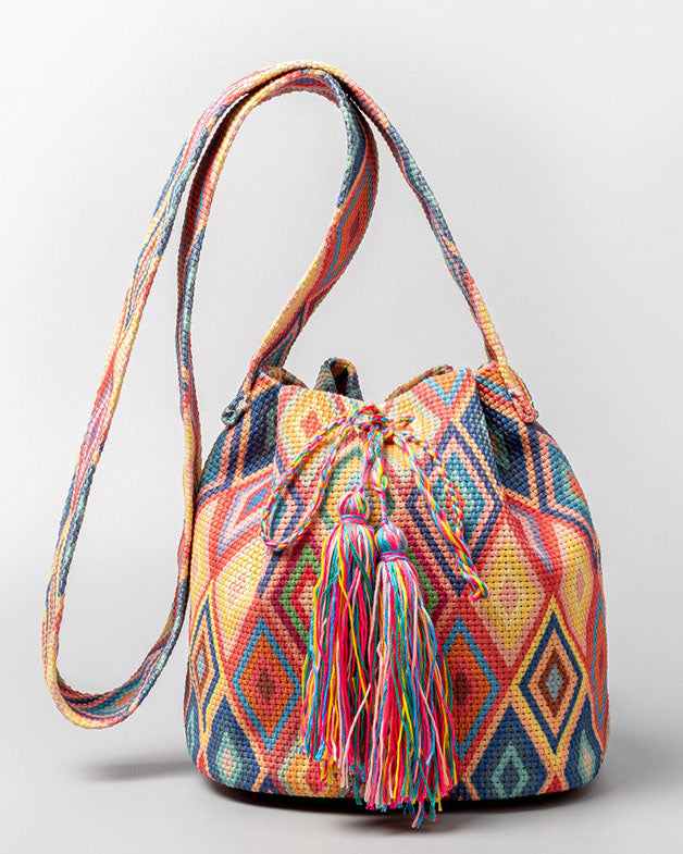 Bolso bombonera de lona con flecos y estampado bohemio