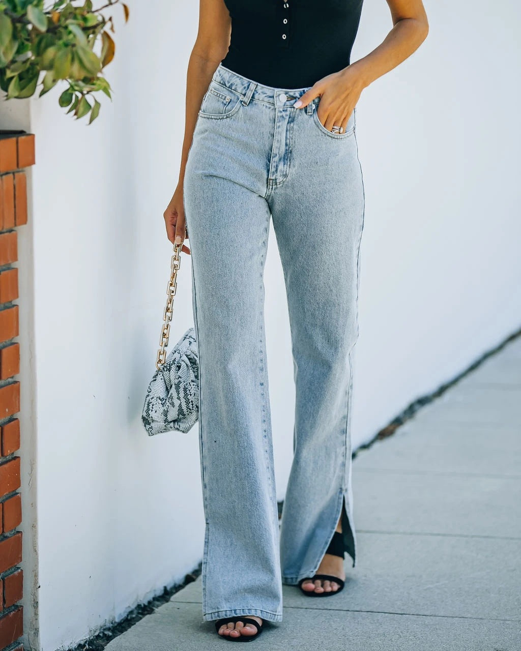 Pantalon évasé taille mi-haute en denim délavé