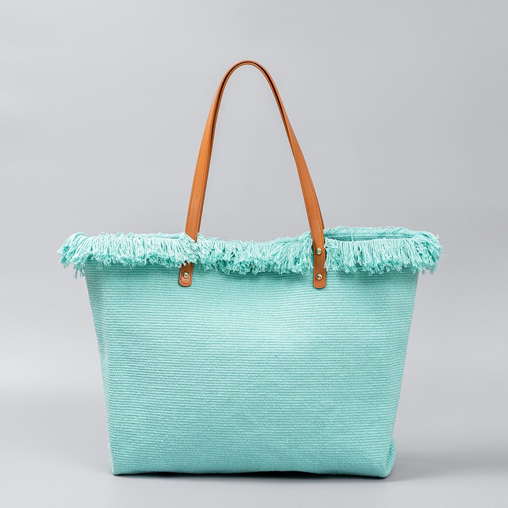 Bolso tote chic de lona con bordes con flecos