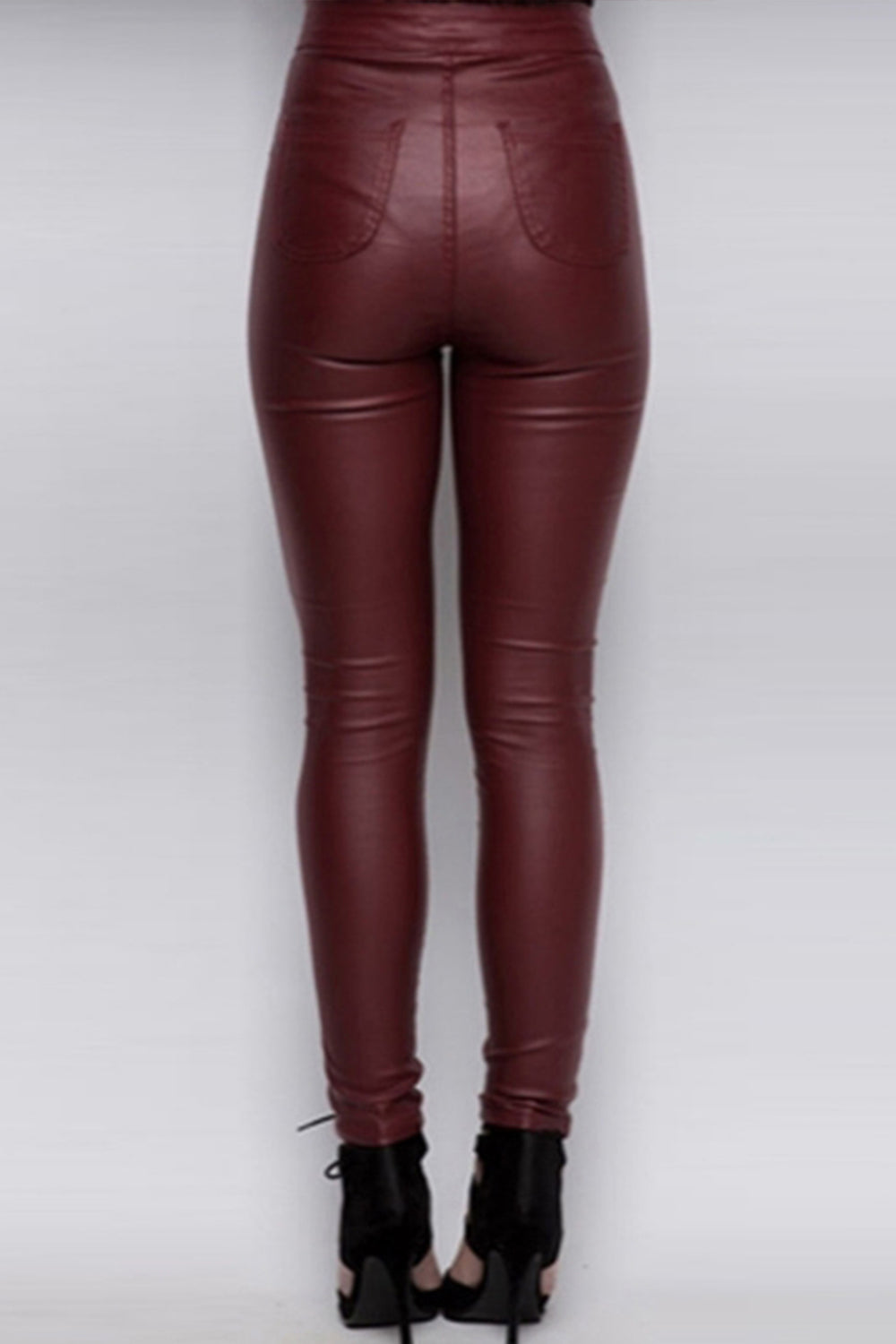 Pantalon en cuir de rue de couleur unie taille haute