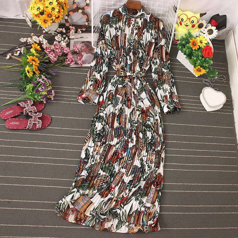 Vestido floral con cordones y mangas largas con cuello alto y cintura delgada