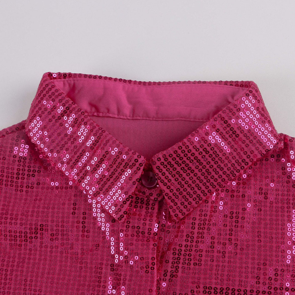 Camisa suelta con lentejuelas brillantes